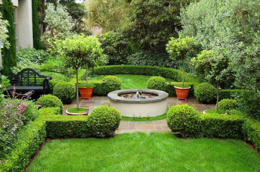 Formal garden with trimmed shrubs and lawn